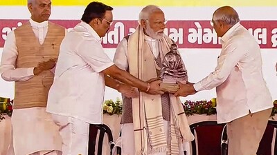 In this photo, PM Narendra Modi can be seen being felicitated by Gujarat Chief Minister Bhupendra Patel during the launch of master plan for Sabarmati Ashram project in Gujarat's Ahmedabad. (PTI) In this photo, PM Narendra Modi can be seen being felicitated by Gujarat Chief Minister Bhupendra Patel during the launch of master plan for Sabarmati Ashram project in Gujarat's Ahmedabad. (PTI)