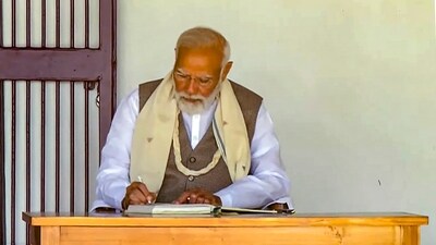 PM Narendra Modi also wrote in the visitor's book at Sabarmati Ashram ahead of the launch of the master plan. (PTI) PM Narendra Modi also wrote in the visitor's book at Sabarmati Ashram ahead of the launch of the master plan. (PTI)