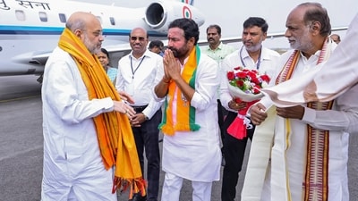 Hyderabad: Amit Shah being received by union minister G Kishan Reddy upon his arrival in Hyderabad, Tuesday. (PTI) Hyderabad: Amit Shah being received by union minister G Kishan Reddy upon his arrival in Hyderabad, Tuesday. (PTI)