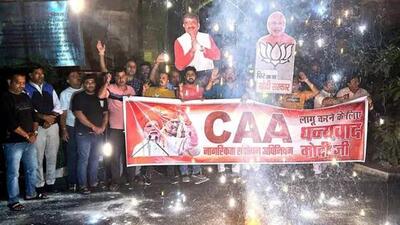 People celebrating after the notification of rules for the implementation of the Citizenship (Amendment) Act, in Bhopal on Monday. (File) People celebrating after the notification of rules for the implementation of the Citizenship (Amendment) Act, in Bhopal on Monday. (File)