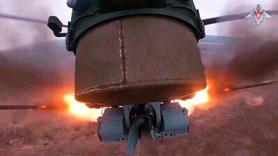 A Russian Mi-28 anti-armor attack helicopter fires rockets on a mission at an undisclosed location in Ukraine. (Russian Defense Ministry Press Service via AP) (AP) A Russian Mi-28 anti-armor attack helicopter fires rockets on a mission at an undisclosed location in Ukraine. (Russian Defense Ministry Press Service via AP) (AP)