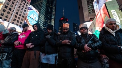 Dozens of Muslim worshippers gathered in New York's Times Square to mark the start of the holy month of Ramadan, with some displaying Palestinian flags in solidarity with people in Gaza. (AFP) Dozens of Muslim worshippers gathered in New York's Times Square to mark the start of the holy month of Ramadan, with some displaying Palestinian flags in solidarity with people in Gaza. (AFP)
