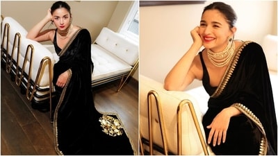 While this Manish Malhotra saree is a perfect sartorial pick for your best friend's sangeet, a black velvet saree Alia had worn to attend Poacher screening in London can be your choice for her wedding. The six yards is by Sabyasachi and features gold embroidery on the borders and floral adornments on the pallu. (Instagram) While this Manish Malhotra saree is a perfect sartorial pick for your best friend's sangeet, a black velvet saree Alia had worn to attend Poacher screening in London can be your choice for her wedding. The six yards is by Sabyasachi and features gold embroidery on the borders and floral adornments on the pallu. (Instagram)