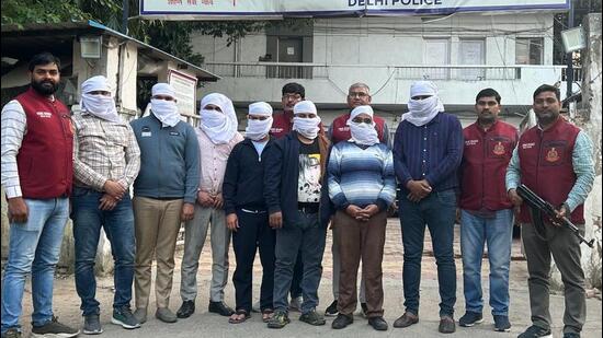 The arrested suspects were identified as Viphil Jain, 46, and Neeraj Chauhan, 38, both masterminds of the racket, Neeraj’s relative Tushar Chauhan, 28, Suraj Shat, 28, Parvez Khan,33, Komal Tiwari,39, and Abhinav Kohli, 30. (HT Photo)