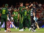 Pakistan's T20I captain Shaheen Shah Afridi (C) celebrates with former captain Babar Azam after the wicket of New Zealand's Tim Seifert during NZ T20I series Pakistan's T20I captain Shaheen Shah Afridi (C) celebrates with former captain Babar Azam after the wicket of New Zealand's Tim Seifert during NZ T20I series
