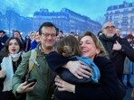 Pro-abortion supporters hug each other after French lawmakers have approved a bill that will enshrine a woman’s right to an abortion in the French Constitution, at Trocadero Plaza in Paris, Monday, March 4, 2024. The vote makes France the first country to have a constitutional right to abortion since the former Yugoslavia inscribed it in its 1974 constitution. (AP Photo/Oleg Cetinic)(AP)