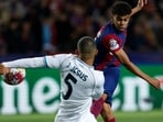 Napoli's Juan Jesus, left, tries to block a shot by Barcelona's Lamine Yamal during the Champions League, round of 16, second leg Napoli's Juan Jesus, left, tries to block a shot by Barcelona's Lamine Yamal during the Champions League, round of 16, second leg