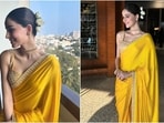 Ananya Panday poses for pictures in a dazzling yellow saree. 