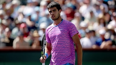 Carlos Alcaraz of Spain celebrates while playing Fabian Marozsan of Hungary during the BNP Paribas Open (Getty Images via AFP) Carlos Alcaraz of Spain celebrates while playing Fabian Marozsan of Hungary during the BNP Paribas Open (Getty Images via AFP)