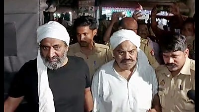 Mafia-turned-politician Atiq Ahmed and Atiq's brother Khalid Azim alias Ashraf (ANI File)