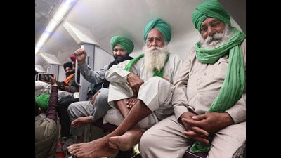Members of the Samyukta Kisan Morcha travel by train as they leave for Delhi to participate in the Kisan Maha Panchayat, at a railway station, in Patiala on Wednesday. (ANI) Members of the Samyukta Kisan Morcha travel by train as they leave for Delhi to participate in the Kisan Maha Panchayat, at a railway station, in Patiala on Wednesday. (ANI)