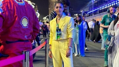 She opted for a bright yellow pant suit with a cropped jacket that she paired with gold jewellery and white sneakers. (Instagram) She opted for a bright yellow pant suit with a cropped jacket that she paired with gold jewellery and white sneakers. (Instagram)