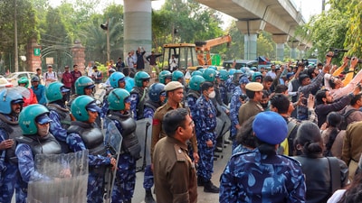 Security was deployed outside JMI and DU after anti-CAA protests (PTI Photo) (PTI) Security was deployed outside JMI and DU after anti-CAA protests (PTI Photo) (PTI)