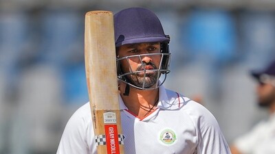 Vidharbha's batter Karun Nair celebrates after scoring a half-century on the fourth day of the Ranji Trophy final vs Mumbai (PTI) Vidharbha's batter Karun Nair celebrates after scoring a half-century on the fourth day of the Ranji Trophy final vs Mumbai (PTI)