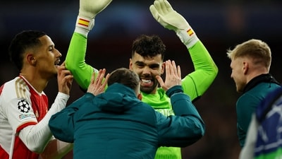 Arsenal's David Raya celebrates after saving from FC Porto's Galeno to win the penalty shoot-out (REUTERS)
