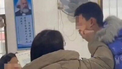 Following the widespread circulation of the video online, the Education Bureau launched an investigation and suspended the teacher. (Source: South China Morning Post) Following the widespread circulation of the video online, the Education Bureau launched an investigation and suspended the teacher. (Source: South China Morning Post)