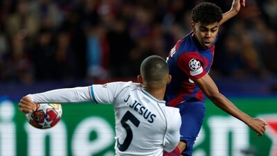 Napoli's Juan Jesus, left, tries to block a shot by Barcelona's Lamine Yamal during the Champions League, round of 16, second leg (AP) Napoli's Juan Jesus, left, tries to block a shot by Barcelona's Lamine Yamal during the Champions League, round of 16, second leg (AP)