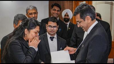The Supreme Court judges who gathered at the apex court’s judges’ lounge before the day’s business began gave a standing ovation to 25-year-old Pragya and her parents. (PTI) The Supreme Court judges who gathered at the apex court’s judges’ lounge before the day’s business began gave a standing ovation to 25-year-old Pragya and her parents. (PTI)