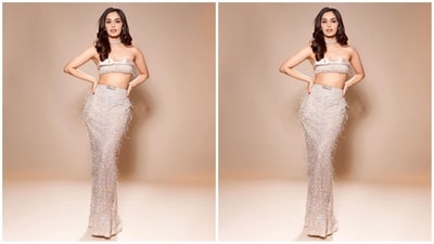 Her outfit consisted of an off-the-shoulder bralette top with a satin lining. She teamed it with a matching maxi skirt covered in fur embellishments. With a perfect combination of fabrics and colours, her outfit is a complete showstopper. (Instagram/@manushi_chhillar) Her outfit consisted of an off-the-shoulder bralette top with a satin lining. She teamed it with a matching maxi skirt covered in fur embellishments. With a perfect combination of fabrics and colours, her outfit is a complete showstopper. (Instagram/@manushi_chhillar)