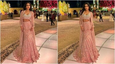Kajol posted Nysa's photos with the caption, "Pink is usually a #barbie #goodgirl colour etc, but somehow this one makes even the pink look like a #badasspink...stunning in all the colours...and I am super biased and not objective at all mom." The pink lehenga she wore in the clicks is from the shelves of designer Manish Malhotra's eponymous label. Meanwhile, celebrity stylist Radhika Mehra styled Nysa in the attire. (Instagram) Kajol posted Nysa's photos with the caption, "Pink is usually a #barbie #goodgirl colour etc, but somehow this one makes even the pink look like a #badasspink...stunning in all the colours...and I am super biased and not objective at all mom." The pink lehenga she wore in the clicks is from the shelves of designer Manish Malhotra's eponymous label. Meanwhile, celebrity stylist Radhika Mehra styled Nysa in the attire. (Instagram)