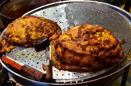Malpua makes for the perfect meal-ender (Bhushan Koyande / HT) Malpua makes for the perfect meal-ender (Bhushan Koyande / HT)