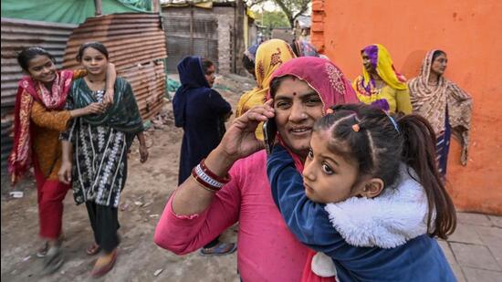Hindu refugees from Pakistan celebrate the implementation of the Citizenship (Amendment) Act at Majnu Ka Tilla in New Delhi on March 12. (Raj K Raj/HT Photo)