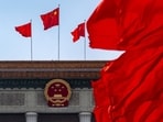 A Chinese national flag at the Great Hall of the People following the closing of the Second Session of the 14th National People's Congress (NPC) in Beijing, China, on Monday, March 11, 2024. The Chinese legislature voted to change a four-decade-old law so it tightens the Communist Party's grip on the cabinet, underscoring President Xi Jinping's drive to give the party control over all the main levers of government. Source: Bloomberg
