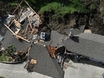 An aerial view shows a property damaged by a landslide, Wednesday, March 13, 2024, in the Sherman Oaks section of Los Angeles. A landslide has destroyed the hillside home and is imperiling at least two others in Los Angeles. (AP Photo/Jae C. Hong) An aerial view shows a property damaged by a landslide, Wednesday, March 13, 2024, in the Sherman Oaks section of Los Angeles. A landslide has destroyed the hillside home and is imperiling at least two others in Los Angeles. (AP Photo/Jae C. Hong)