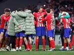 Atletico Madrid's Jan Oblak with teammates celebrate after the match.