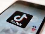 The TikTok logo is displayed on a smartphone screen in Tokyo, Japan. The TikTok logo is displayed on a smartphone screen in Tokyo, Japan.