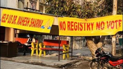 Banners reading ‘Help us, Dr Mahesh Sharma’, ‘No registry, no vote’ have come up at two high-rise societies -- Futec Gateway and JM Aroma society. (HT Photo) Banners reading ‘Help us, Dr Mahesh Sharma’, ‘No registry, no vote’ have come up at two high-rise societies -- Futec Gateway and JM Aroma society. (HT Photo)