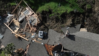 An aerial view shows a property damaged by a landslide, Wednesday, March 13, 2024, in the Sherman Oaks section of Los Angeles. A landslide has destroyed the hillside home and is imperiling at least two others in Los Angeles. (AP Photo/Jae C. Hong) (AP) An aerial view shows a property damaged by a landslide, Wednesday, March 13, 2024, in the Sherman Oaks section of Los Angeles. A landslide has destroyed the hillside home and is imperiling at least two others in Los Angeles. (AP Photo/Jae C. Hong) (AP)