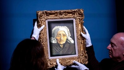 Personnel members hang for display a rare Vincent van Gogh painting, "Tete de paysanne a la coiffe blanche" (Head of an old farmer's wife with a white hat), painted circa 1884, that will be auctionned at the TEFAF Maastricht art fair, in Maastricht, on March 6, 2024. The TEFAF Maastricht art fair runs from March 9 to 14, 2024. (Photo by Nick Gammon / AFP) / RESTRICTED TO EDITORIAL USE - MANDATORY MENTION OF THE ARTIST UPON PUBLICATION - TO ILLUSTRATE THE EVENT AS SPECIFIED IN THE CAPTION (AFP) Personnel members hang for display a rare Vincent van Gogh painting, "Tete de paysanne a la coiffe blanche" (Head of an old farmer's wife with a white hat), painted circa 1884, that will be auctionned at the TEFAF Maastricht art fair, in Maastricht, on March 6, 2024. The TEFAF Maastricht art fair runs from March 9 to 14, 2024. (Photo by Nick Gammon / AFP) / RESTRICTED TO EDITORIAL USE - MANDATORY MENTION OF THE ARTIST UPON PUBLICATION - TO ILLUSTRATE THE EVENT AS SPECIFIED IN THE CAPTION (AFP)
