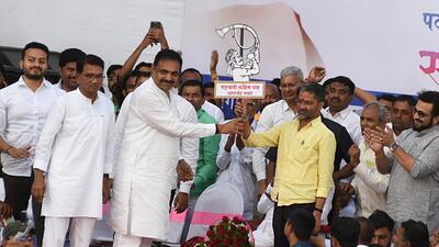 Nilesh Lanke (second from right) holds the NCP (SCP) symbol in the presence of president Jayant Patil and MP Amol Kolhe (right) in Pune on Thursday. (Mahendra Kolhe/HT Photo) Nilesh Lanke (second from right) holds the NCP (SCP) symbol in the presence of president Jayant Patil and MP Amol Kolhe (right) in Pune on Thursday. (Mahendra Kolhe/HT Photo)