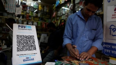 Paytm Payments Bank deadline: A QR code of Paytm is seen at a mobile repairing shop in Kolkata, India. (Reuters)