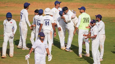 Mumbai's Musheer Khan celebrates with teammates the wicket of Vidharbha's batter Karun Nair during Ranji Trophy final (PTI) Mumbai's Musheer Khan celebrates with teammates the wicket of Vidharbha's batter Karun Nair during Ranji Trophy final (PTI)