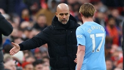 Manchester City's Kevin De Bruyne with manager Pep Guardiola after being substituted (REUTERS)