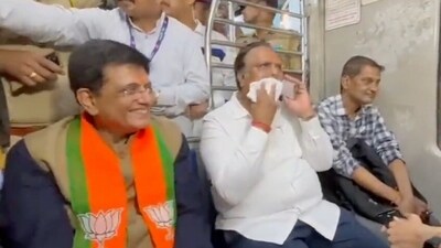 Piyush Goyal travels in Mumbai's local train (ANI) Piyush Goyal travels in Mumbai's local train (ANI)