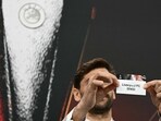 Spanish former footballer Fernando Llorente holds the paper slip of Liverpool FC during the 2023-2024 UEFA Europa League football tournament quarter-finals and semi-finals draw at the House of European Football in Nyon, on March 15