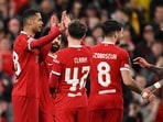 Liverpool's Dutch striker Cody Gakpo (L) celebrates scoring the team's fourth goal with Mohamed Salah, Bobby Clark and Darwin Nunez 