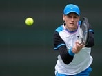 Jannik Sinner, of Italy, returns to Jiri Lehecka, of the Czech Republic, during a quarterfinal match at the BNP Paribas Open tennis tournament