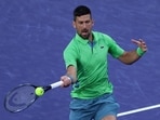 Novak Djokovic in action. Novak Djokovic in action.