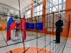A man casts his ballot in Russia's presidential election in Saint Petersburg on March 15, 2024.