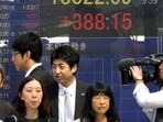 Japan’s economy slid back into recession in July-September as uncertainty over the overseas outlook hurt business investment.