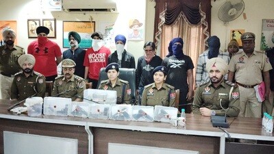 Acting on the tip-off, the Phagwara police intercepted a Maruti Swift car and seized seven weapons and live cartridges from the possession of the accused. (HT photo) Acting on the tip-off, the Phagwara police intercepted a Maruti Swift car and seized seven weapons and live cartridges from the possession of the accused. (HT photo)