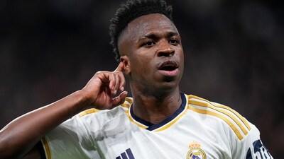Real Madrid's Vinicius Junior celebrates after scoring his side's opening goal during the Champions League round of 16 second leg soccer match between Real Madrid and RB Leipzig (AP) Real Madrid's Vinicius Junior celebrates after scoring his side's opening goal during the Champions League round of 16 second leg soccer match between Real Madrid and RB Leipzig (AP)