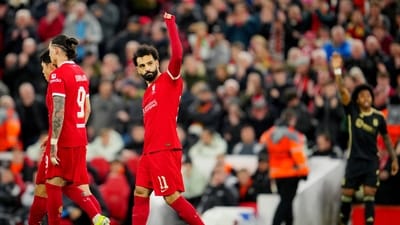 Liverpool's Mohamed Salah celebrates after scoring his side's third goal. (AP) Liverpool's Mohamed Salah celebrates after scoring his side's third goal. (AP)