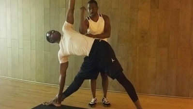 5. Extended Triangle Pose (Utthita Trikonasana): Start in a wide-legged stance, then turn one foot out and extend your arms parallel to the floor. Reach toward the extended foot while keeping your torso elongated and your arms strong. Hold the pose for several breaths on each side, feeling the stretch in your arms and upper body. (Photo by Twitter/UKIYENGARYOGA) 5. Extended Triangle Pose (Utthita Trikonasana): Start in a wide-legged stance, then turn one foot out and extend your arms parallel to the floor. Reach toward the extended foot while keeping your torso elongated and your arms strong. Hold the pose for several breaths on each side, feeling the stretch in your arms and upper body. (Photo by Twitter/UKIYENGARYOGA)