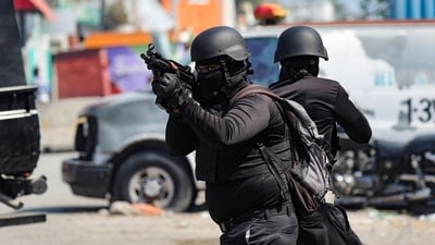 Police officers take part in an operation on the surroundings of the National Penitentiary following a fire, as a powerful gang leader in Haiti has issued a threatening message aimed at political leaders who would take part in a still-unformed transition council for the country, in Port-au-Prince, Haiti, March 14, 2024. REUTERS/Ralph Tedy Erol/File Photo (REUTERS)