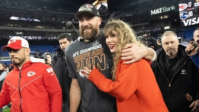 FILE - Kansas City Chiefs tight end Travis Kelce and Taylor Swift walk together after an AFC Championship NFL football game between the Chiefs and the Baltimore Ravens, Jan. 28, 2024, in Baltimore.. Taylor Swift, who is holding concerts in Japan, will make it in time for the Super Bowl to see her partner and football superstar Travis Kelce play. (AP Photo/Julio Cortez, File) (AP) FILE - Kansas City Chiefs tight end Travis Kelce and Taylor Swift walk together after an AFC Championship NFL football game between the Chiefs and the Baltimore Ravens, Jan. 28, 2024, in Baltimore.. Taylor Swift, who is holding concerts in Japan, will make it in time for the Super Bowl to see her partner and football superstar Travis Kelce play. (AP Photo/Julio Cortez, File) (AP)